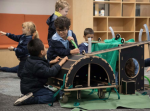 Children interacting with the Nüdel Kart as part of curriculum and play based learning